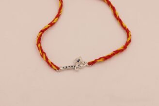 Divine Flute Rakhi (Sterling Silver 925) in Auspicious Kalawa