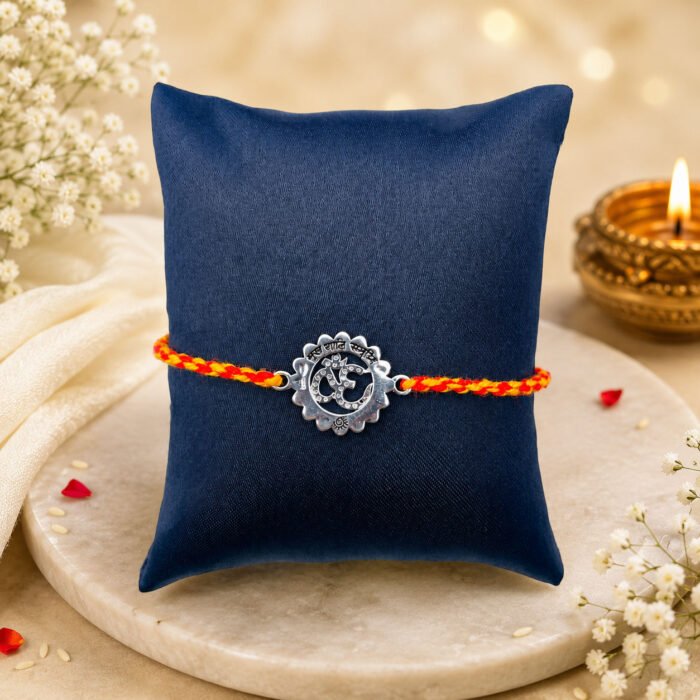 Divine Om Rakhi (Sterling Silver 925) in Auspicious Kalawa Divine Om Rakhi (Sterling Silver 925) in Auspicious Kalawa