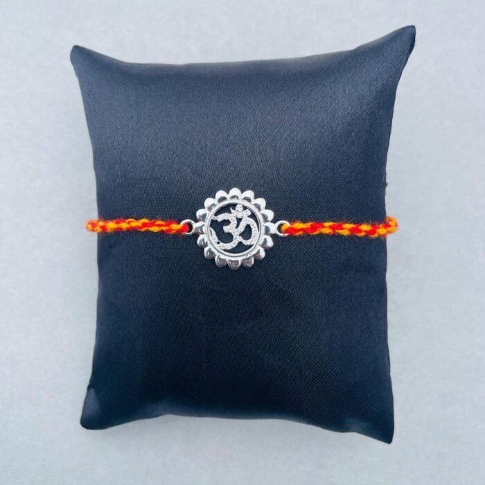 Divine Om Rakhi (Sterling Silver 925) in Auspicious Kalawa Divine Om Rakhi (Sterling Silver 925) in Auspicious Kalawa