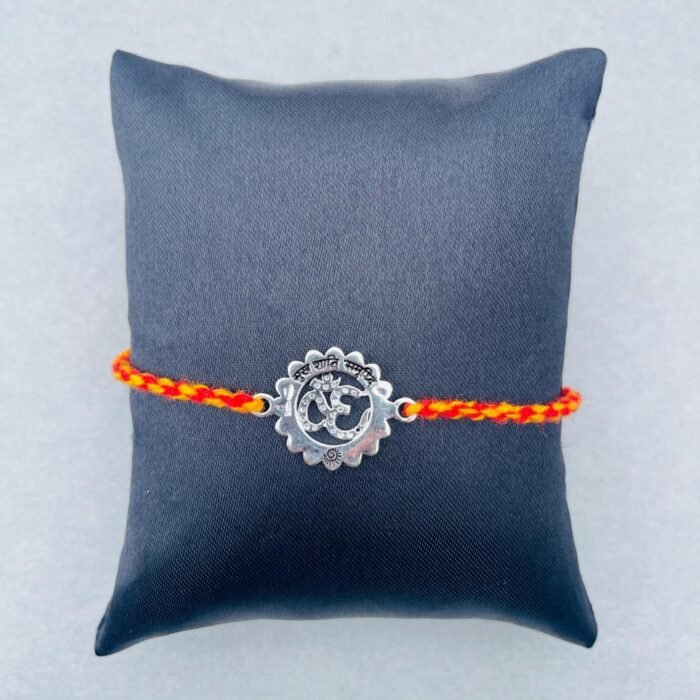 Divine Om Rakhi (Sterling Silver 925) in Auspicious Kalawa Divine Om Rakhi (Sterling Silver 925) in Auspicious Kalawa