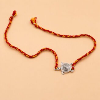 Divine Turtle Rakhi (Sterling Silver 925) in Auspicious Kalawa Divine Turtle Rakhi (Sterling Silver 925) in Auspicious Kalawa